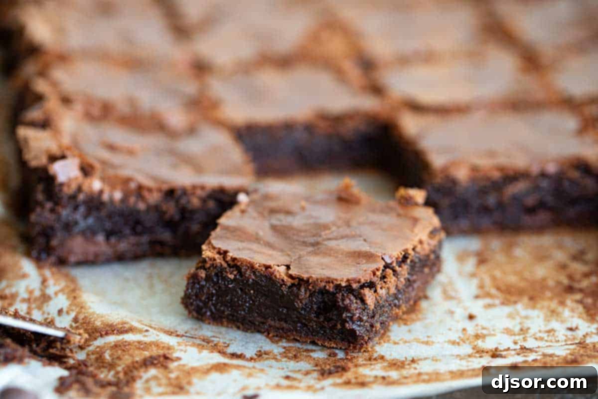 homemade brownies on parchment paper