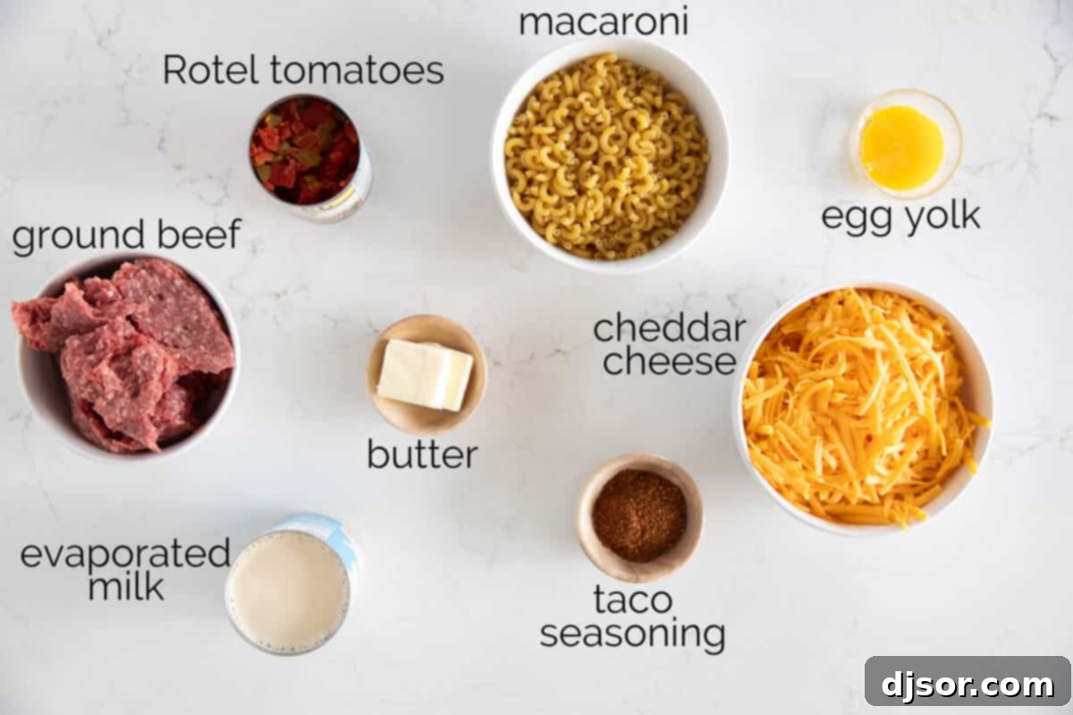 A collection of fresh ingredients laid out on a counter, ready to make Taco Mac and Cheese.