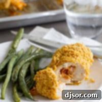 Cheddar and Bacon Stuffed Chicken on a dinner plate