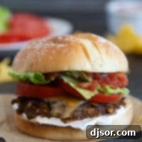 Fiesta Burgers 9 Taco burger topped with cheese.