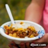 Bowl of Frito Pie made in the Dutch oven