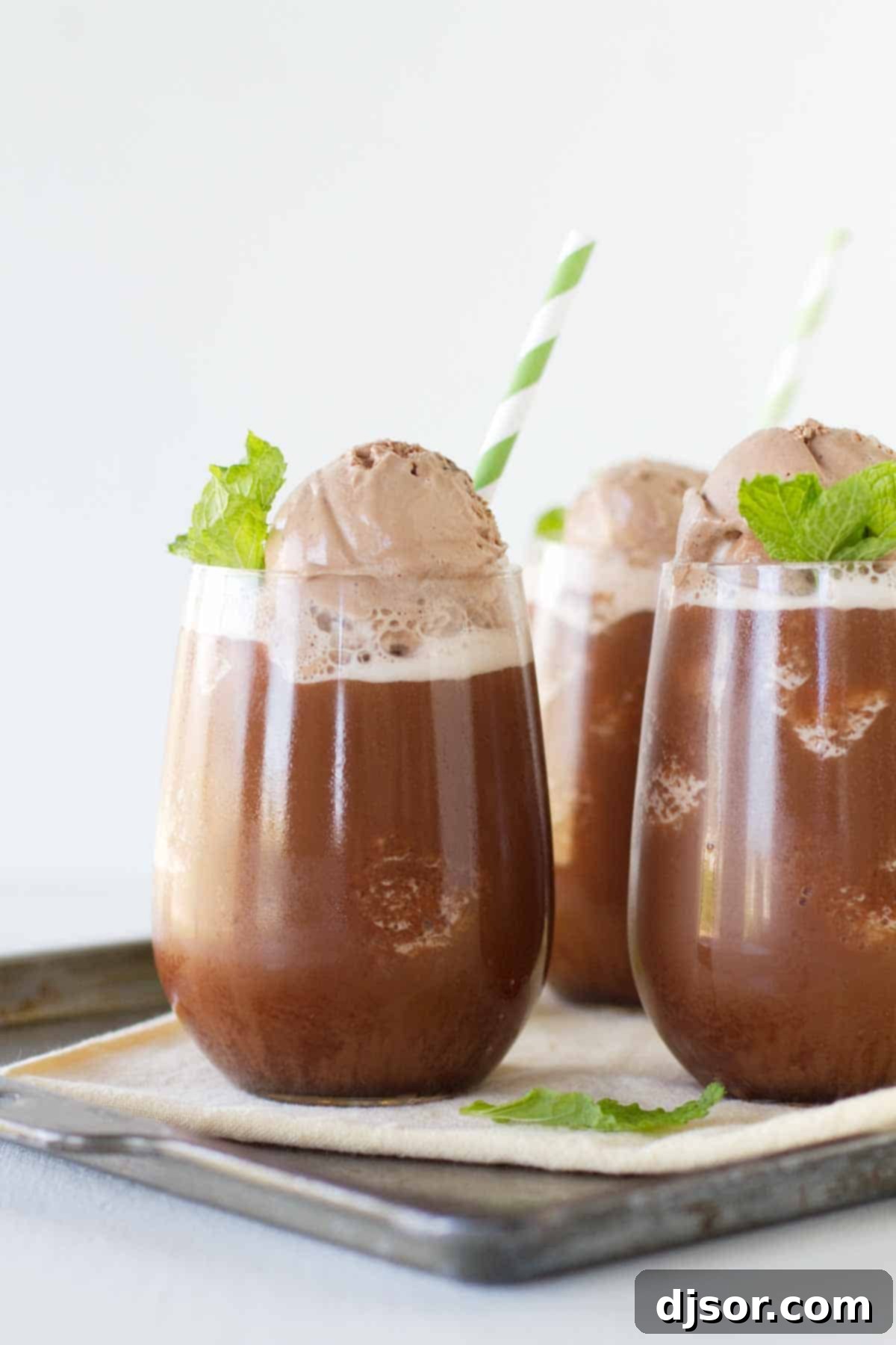 Ultimate Iced Chocolate: A Refreshing Summer Indulgence Decadent Iced Chocolate drink topped with a generous scoop of creamy chocolate gelato, perfect for summer