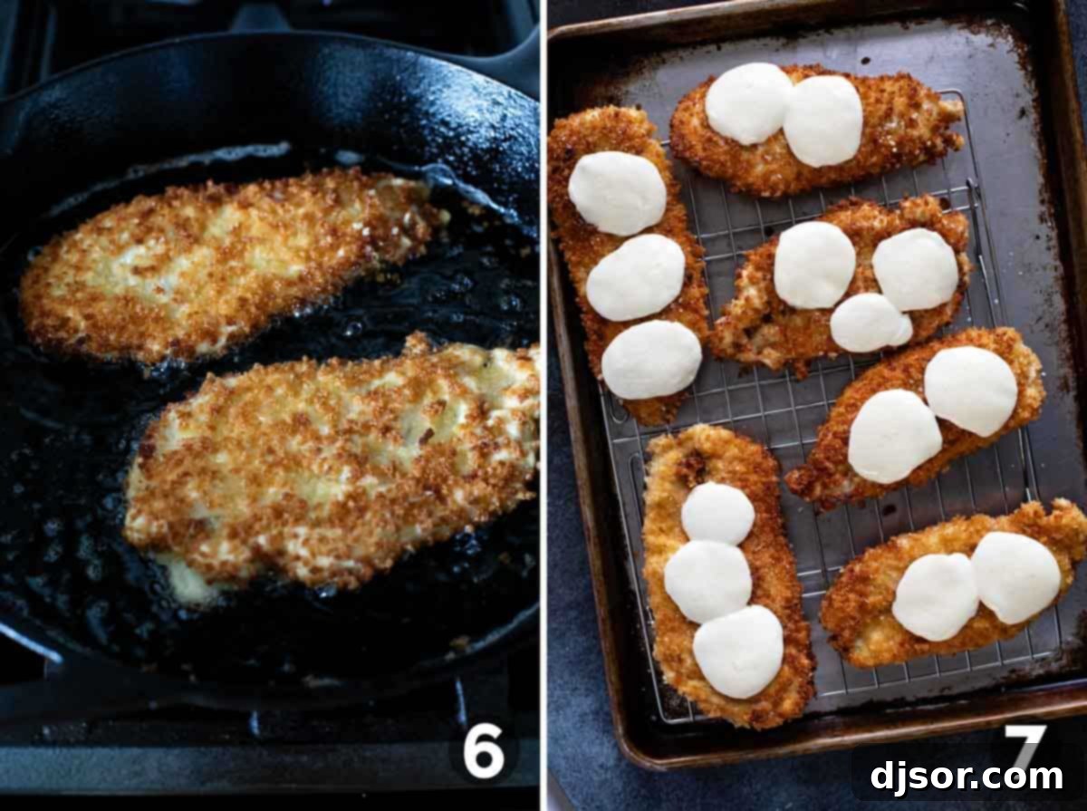 Shallow frying a breaded chicken breast in a cast iron skillet until golden brown, then topping another cooked chicken breast with fresh slices of mozzarella cheese on a baking sheet.