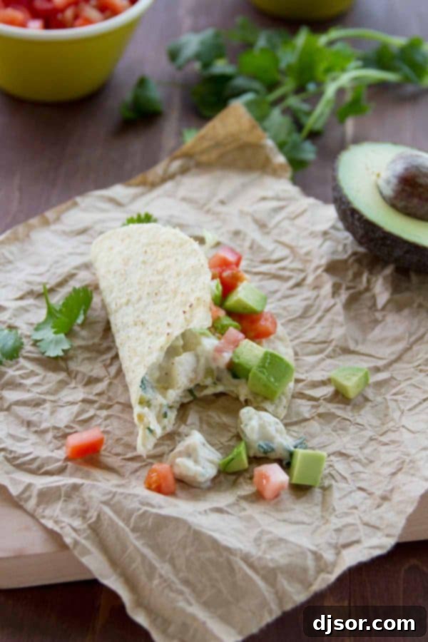 Velvety Cilantro Chile Chicken Tacos 4 Creamy Cilantro Chile Chicken Taco fully assembled with fresh toppings