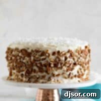 Velvet Cream Indulgence 2 Full Italian Cream Cake on a cake stand