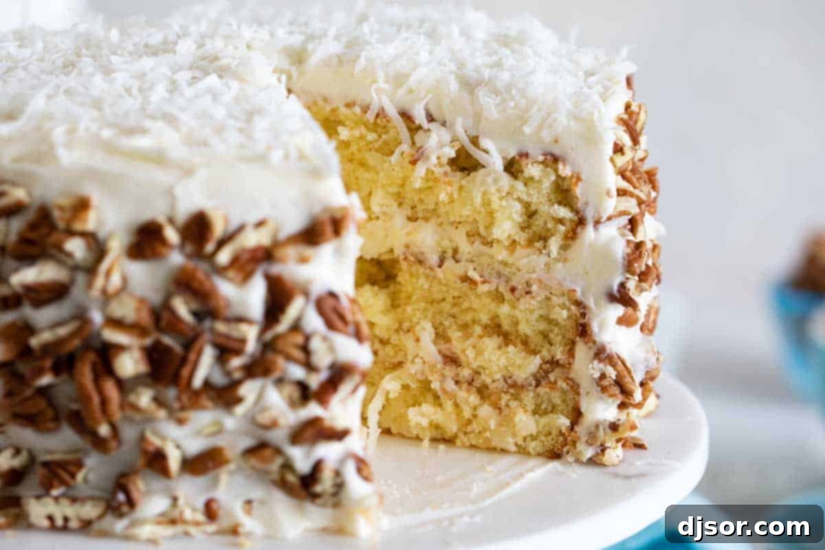 The delightful layers and texture of a perfectly baked Italian Cream Cake. interior of a slice of Italian Cream Cake, showing layers and moist crumb