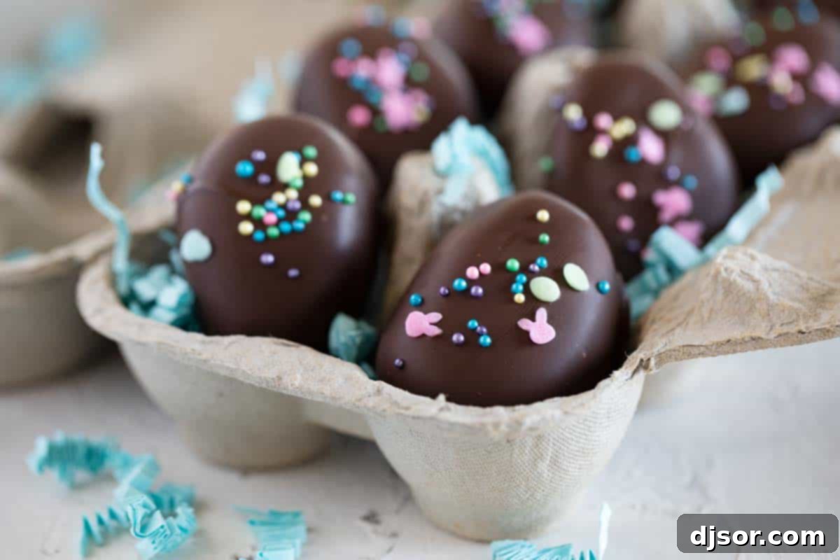 Homemade Easter Egg Marshmallow Creme Truffles: A Sweet Delight An open egg carton filled with perfectly crafted, chocolate-covered Easter Egg Marshmallow Creme Truffles, ready for enjoyment.