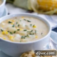 Cozy Potato Corn Chowder 2 chowder topped with chives