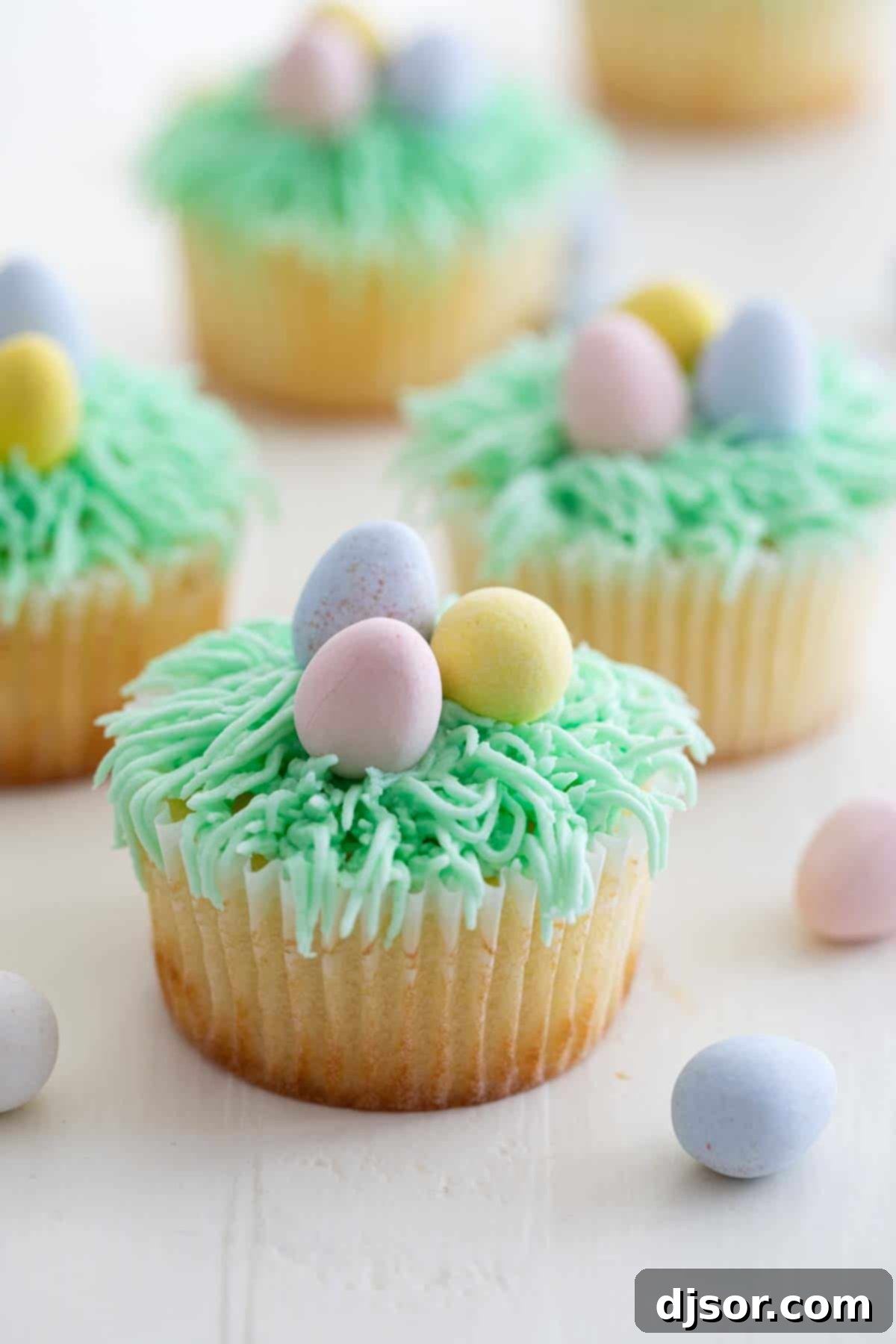 Easter Cupcakes Recipe topped with candy eggs, ready for serving.