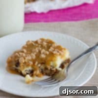 Caramel Cookie Cheesecake Bar with a bite taken from it.