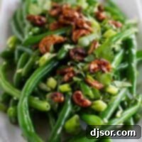 Asian Green Bean Salad topped with cashews, a vibrant and fresh side dish.