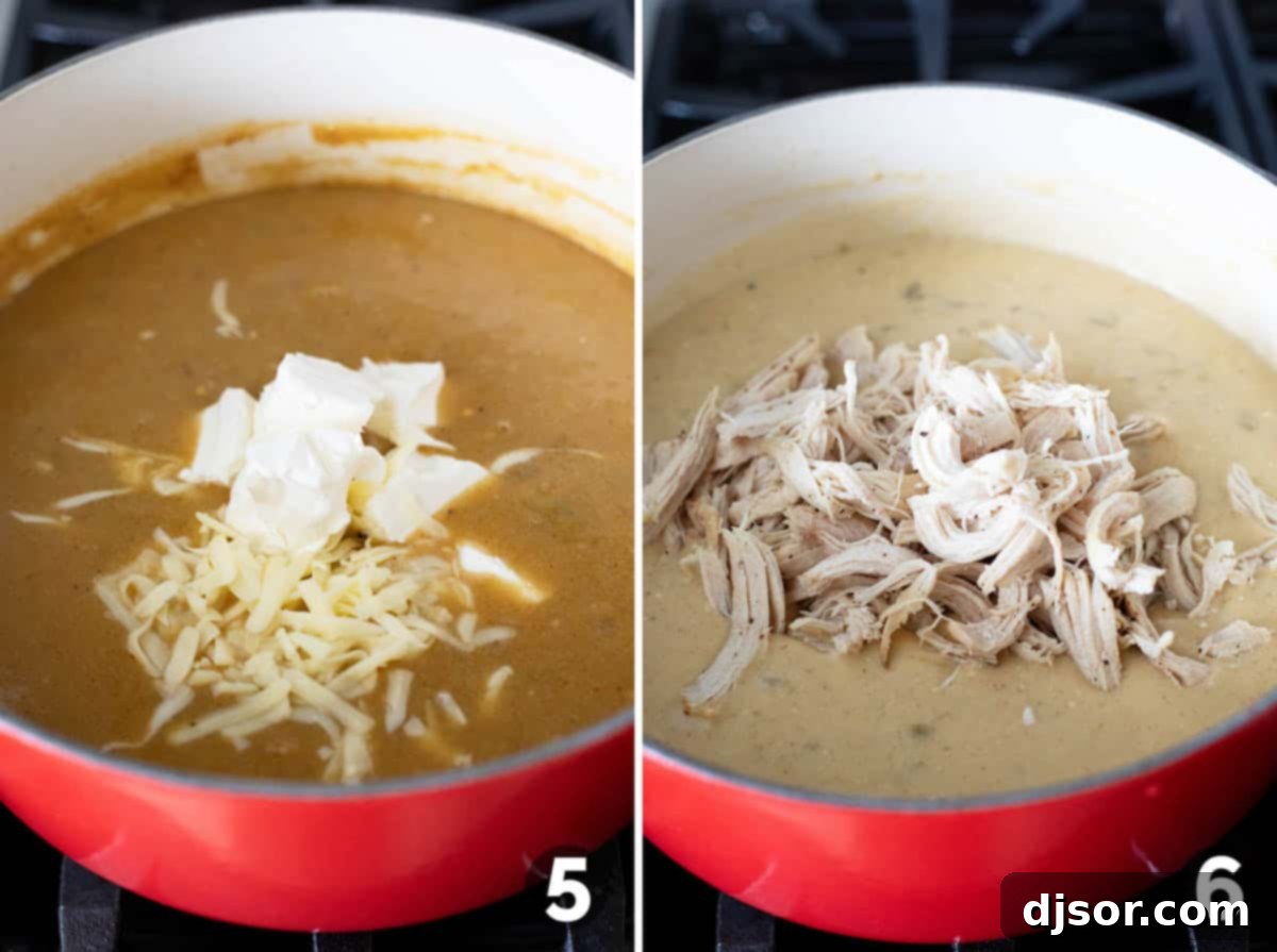 Zesty Verde Chicken Enchilada Soup 6 Shredded cheese and cream cheese being added to a simmering pot of green chicken enchilada soup, showing the creamy texture forming.