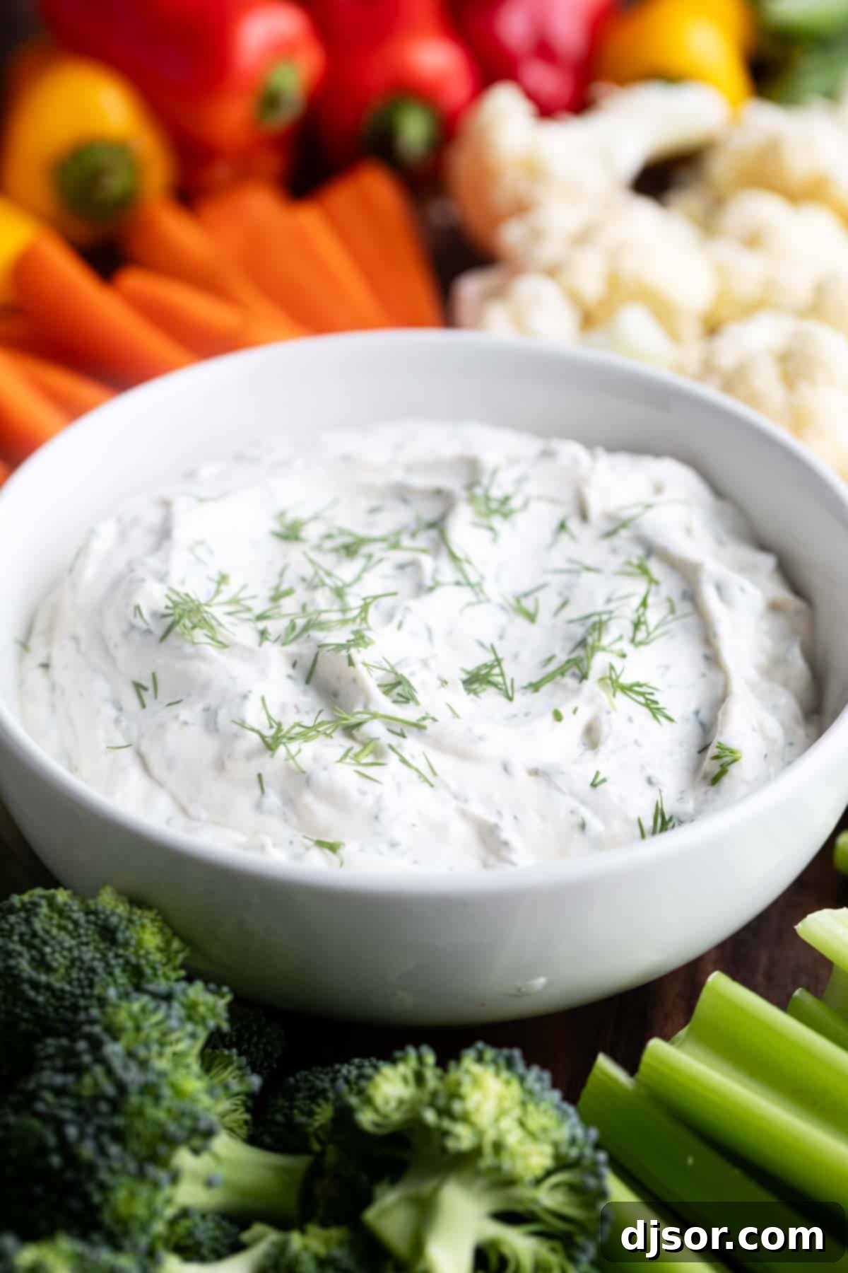 Creamy Dill Delight 6 Bowl of dill dip topped with fresh dill.