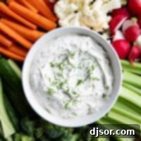 Creamy Dill Delight 8 Bowl filled with dill dip, surrounded by assorted vegetables.