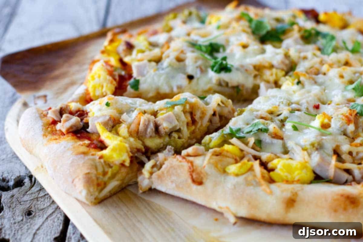 Mexican Turkey Breakfast Pizza - The Ultimate Leftover Thanksgiving Turkey Recipe Delicious Mexican Turkey Breakfast Pizza with eggs, turkey, and hash browns