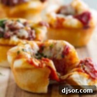Savory Pizza Muffins 5 Pizza Cups with a bite taken from one.