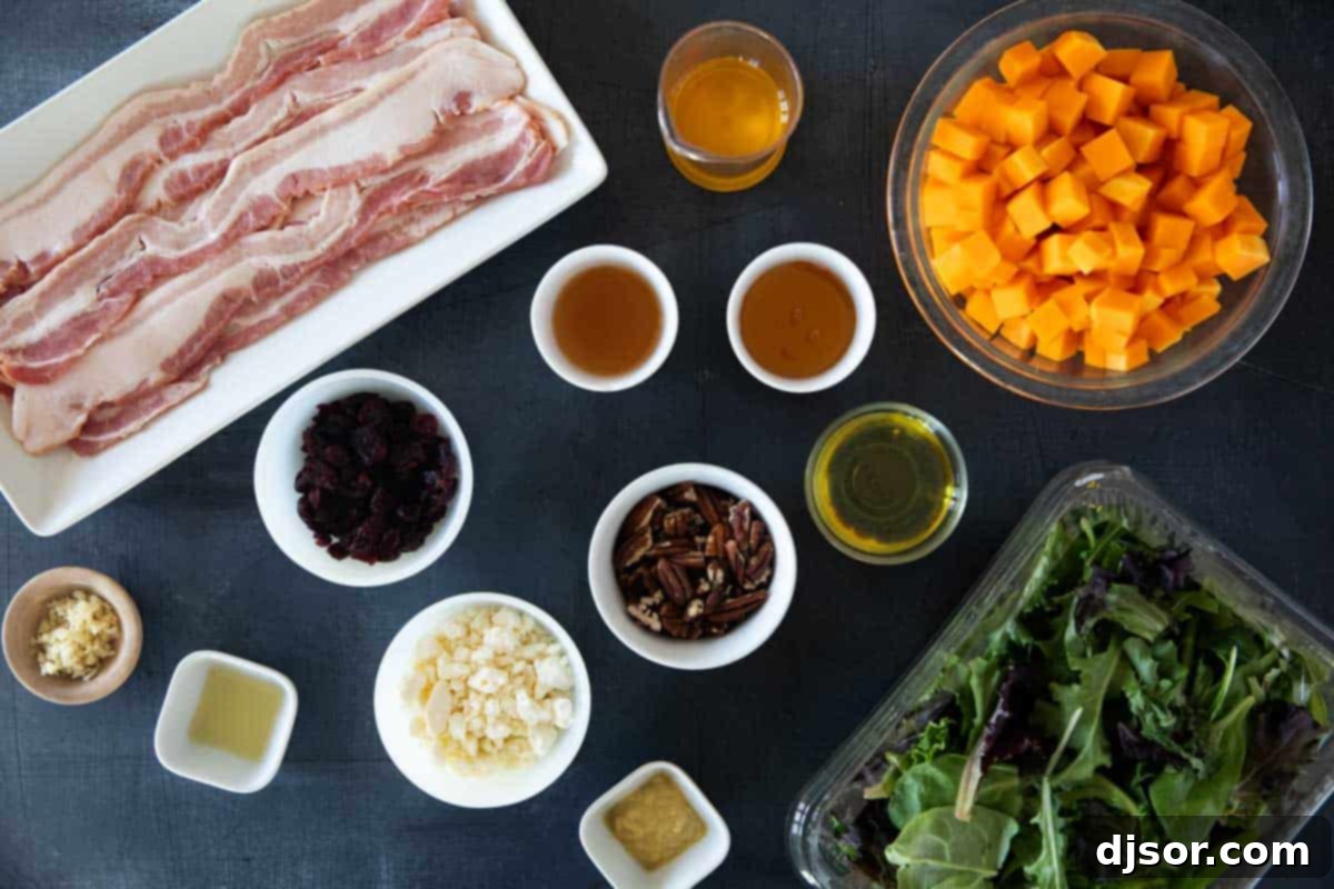Autumn Harvest Medley 3 A colorful array of fresh ingredients for Fall Harvest Salad laid out on a wooden board, including a whole butternut squash, a bowl of mixed greens, crispy bacon, pecans, dried cranberries, and various dressing components.