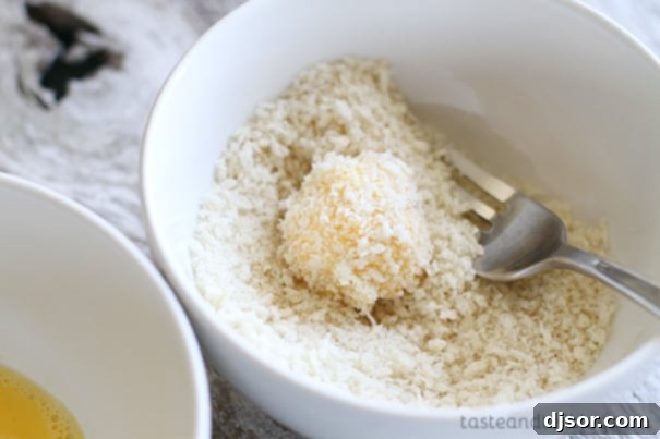 Ultimate Loaded Potato Poppers 6 Rolling potato balls in panko breadcrumbs