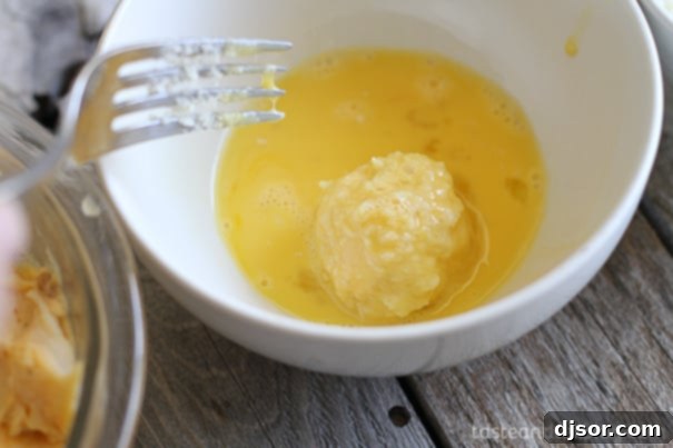 Ultimate Loaded Potato Poppers 7 Second dip in egg wash