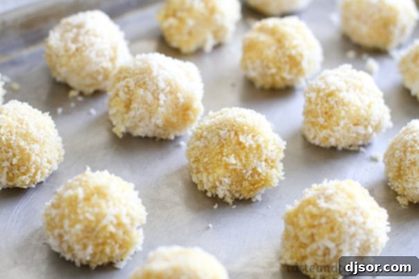 Ultimate Loaded Potato Poppers 9 Chilled Fried Loaded Mashed Potato Balls on a baking sheet