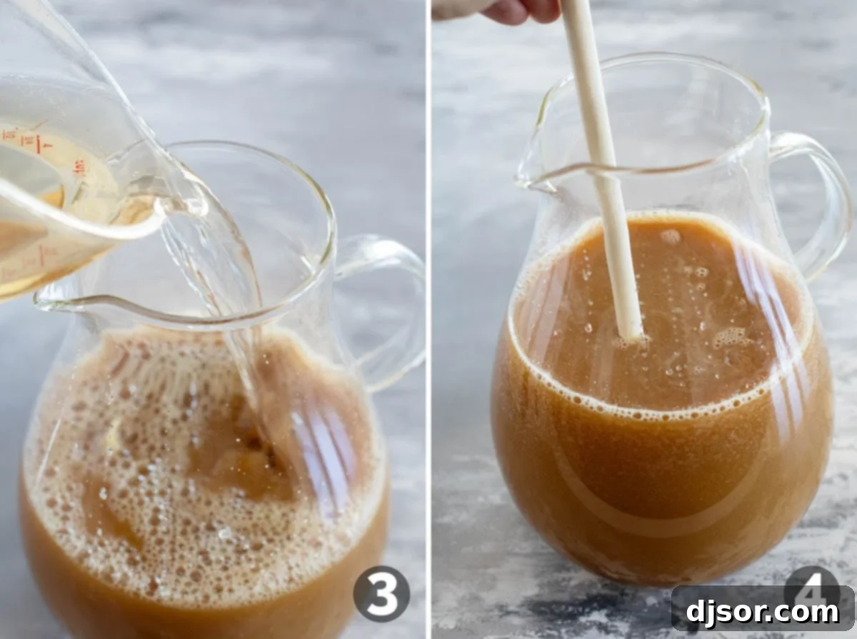 Adding ginger ale to a pitcher of apple cider punch and stirring to combine.