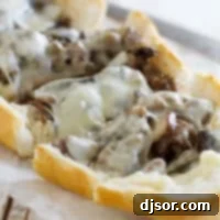 Gourmet Sausage and Portobello French Bread Pizza 5 French bread pizza topped with sausage, portobello mushrooms, and cheese.