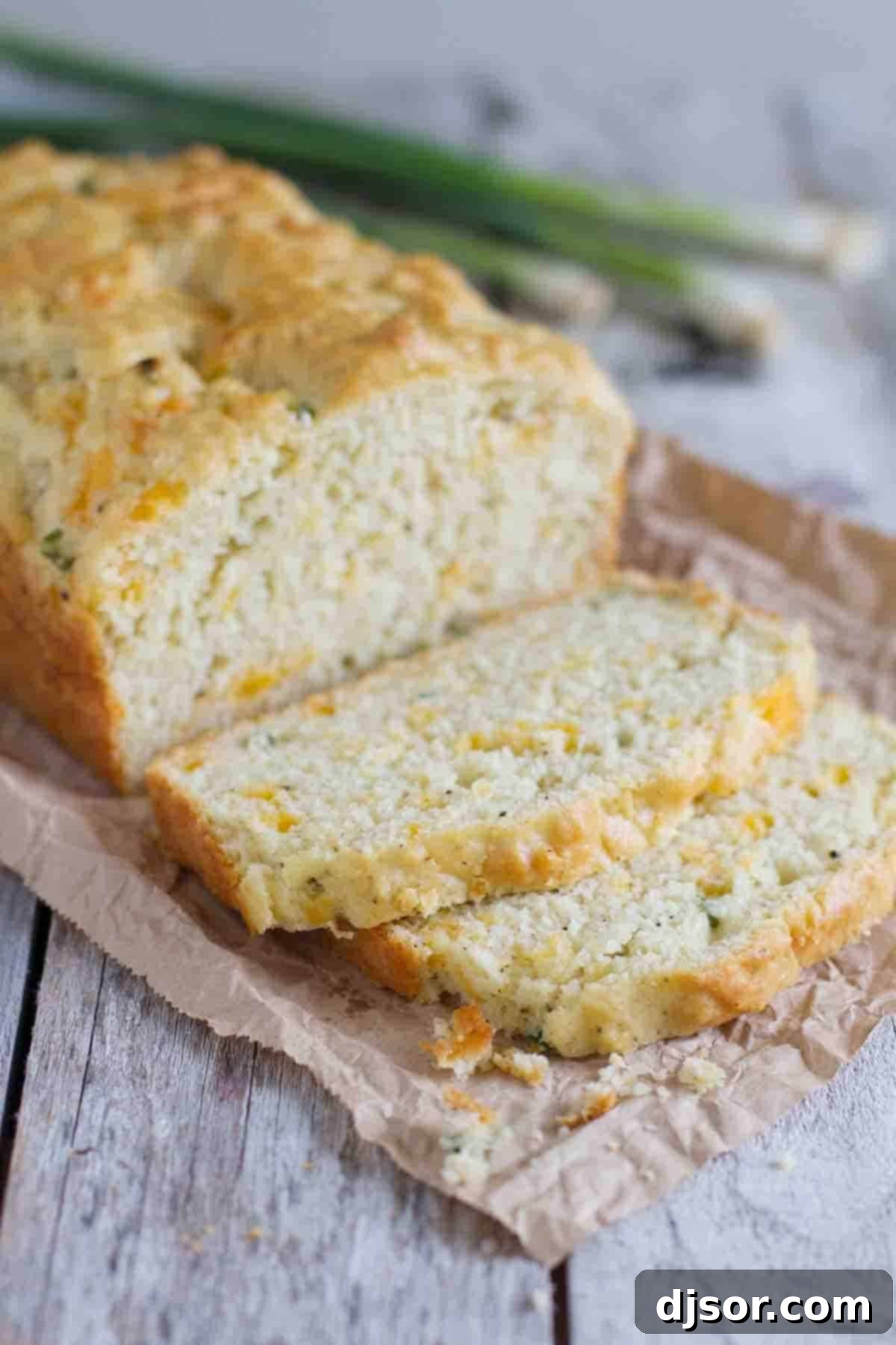 Savory quick bread made with cheese and pepper, freshly baked and golden.