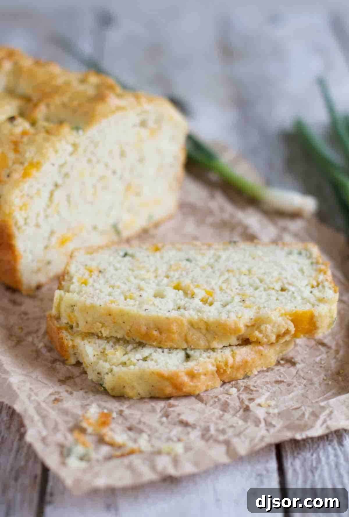 Slices of Peppery Cheese Bread arranged beautifully on a serving board.