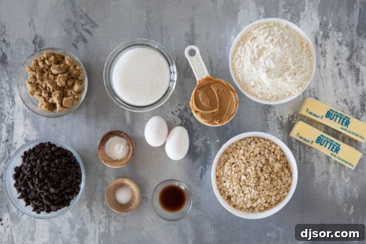Ultimate Peanut Butter Oatmeal Chocolate Chip Cookies 3 Ingredients for making homemade Peanut Butter Oatmeal Chocolate Chip Cookies laid out on a counter.