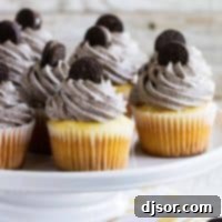 Cookies and Cream Cupcakes on a baking stand.
