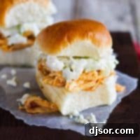 A top-down view of Buffalo Chicken Sandwiches on slider buns, highlighting the delicious filling.