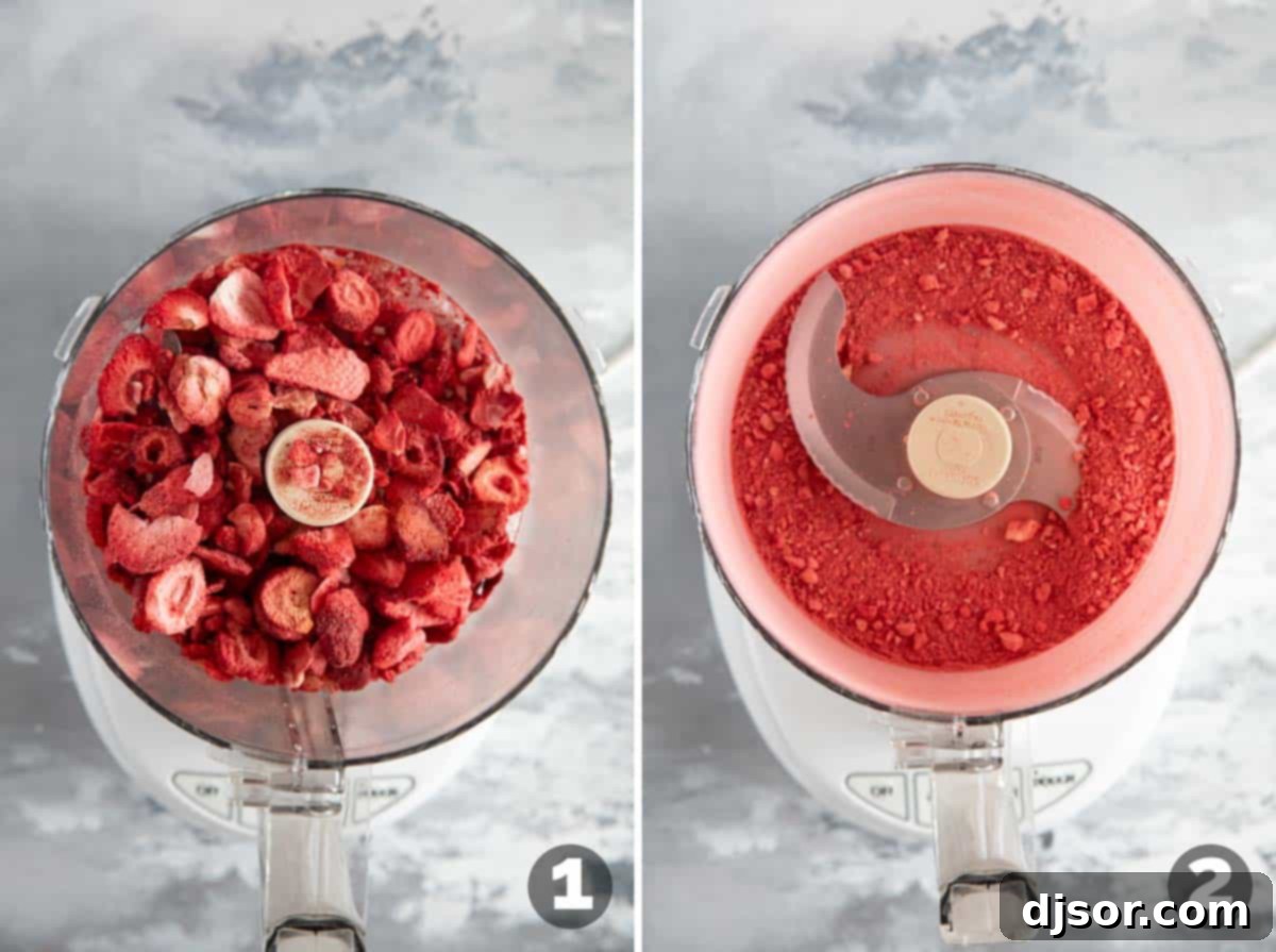 Pink Strawberry Crispy Treats 4 A food processor actively grinding freeze-dried strawberries into a fine powder for the treats.