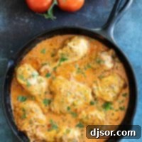 Velvety Paprika Chicken Stew 2 overhead view of chicken paprikash sprinkled with parsley
