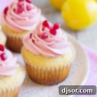 Lemon Pomegranate Cupcakes on a plate.