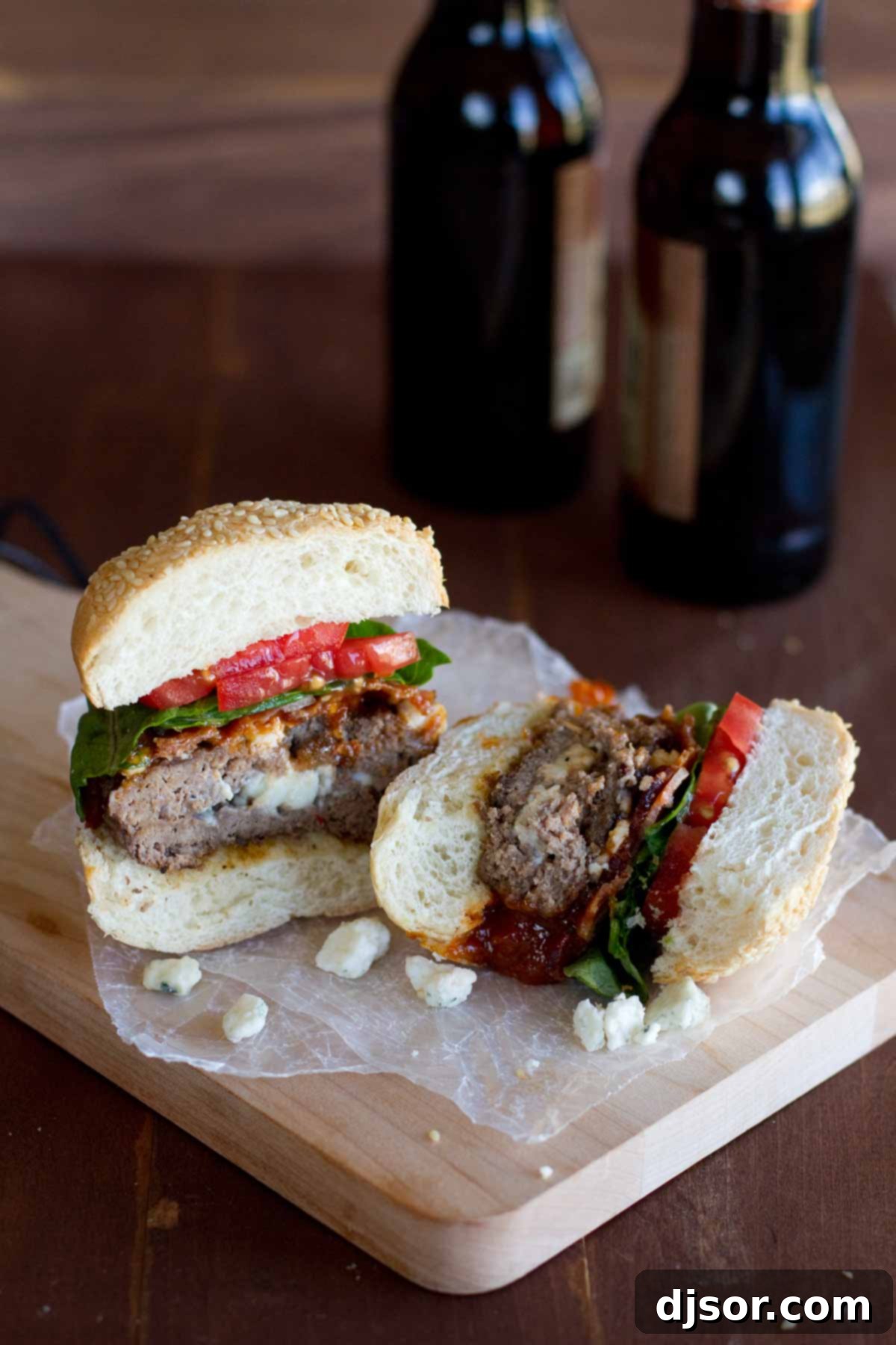 Sweet Heat Chipotle Honey BBQ Burgers 3 Chipotle Honey BBQ Burger cut in half to show cheese stuffed patty.