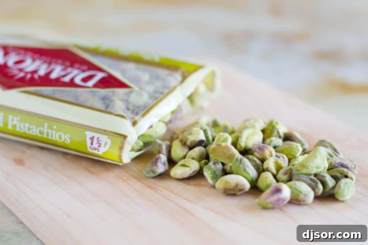 An open bag of Diamond shelled pistachios, highlighting their vibrant green color and readiness for use in baking.