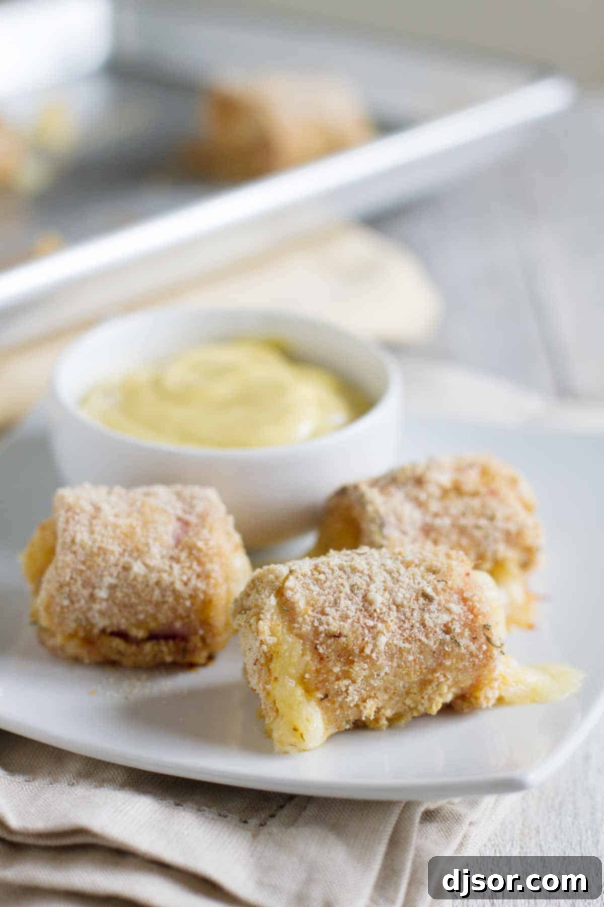 Three Chicken Cordon Bleu Nuggets with dipping sauce