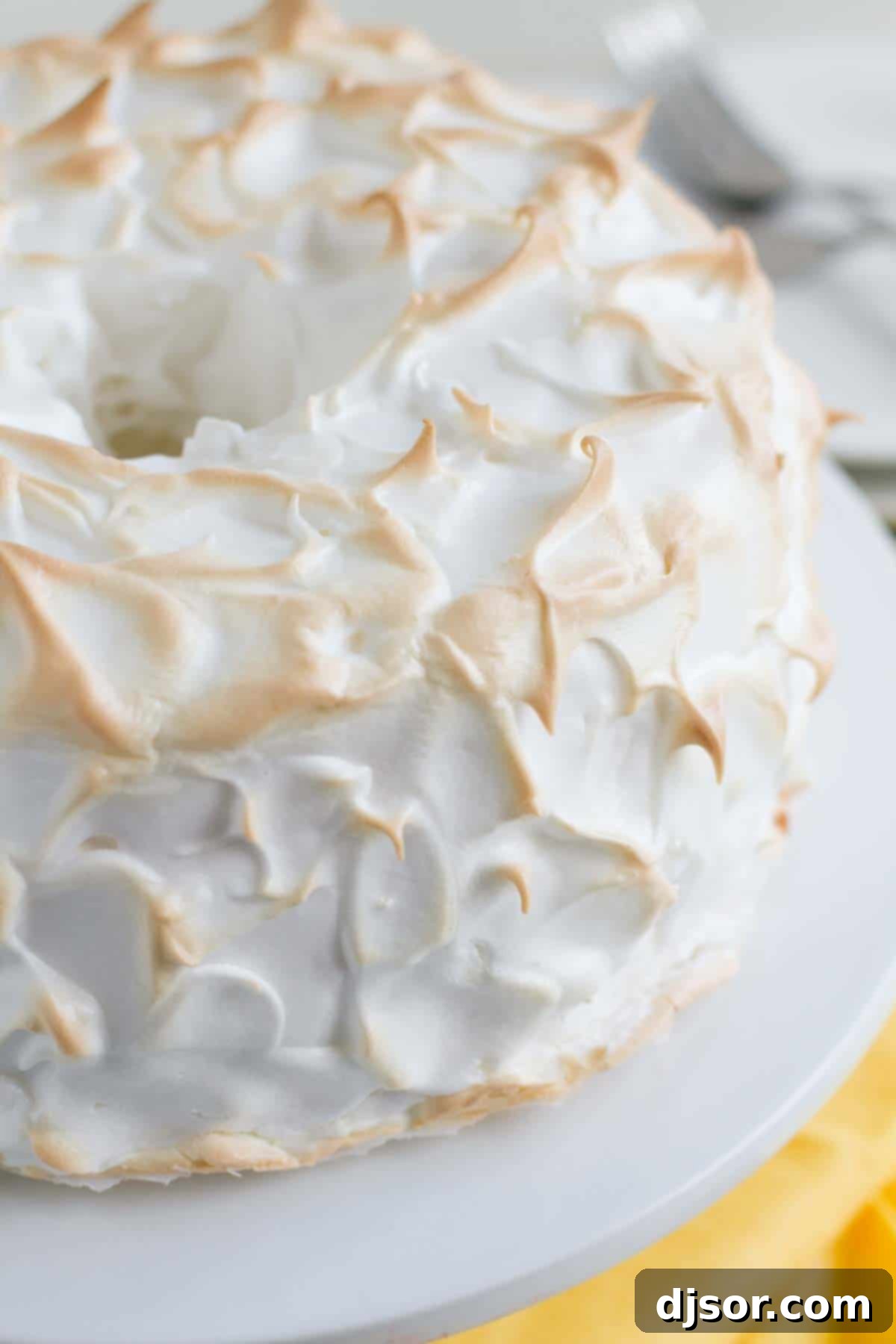 Celestial Lemon Meringue Dream 3 meringue on the outside of an angel food cake