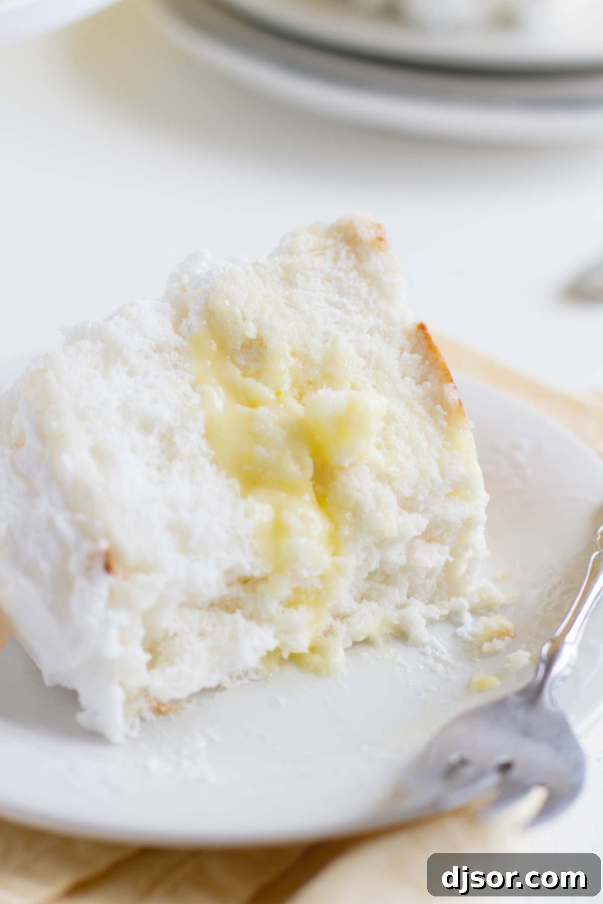 Celestial Lemon Meringue Dream 5 slice of Lemon Meringue Angel Cake with part eaten