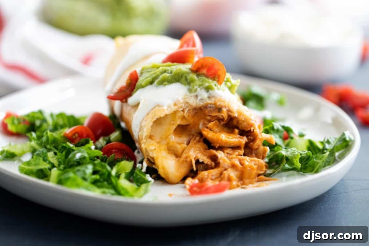 chicken chimichanga cut open, showing the delicious filling