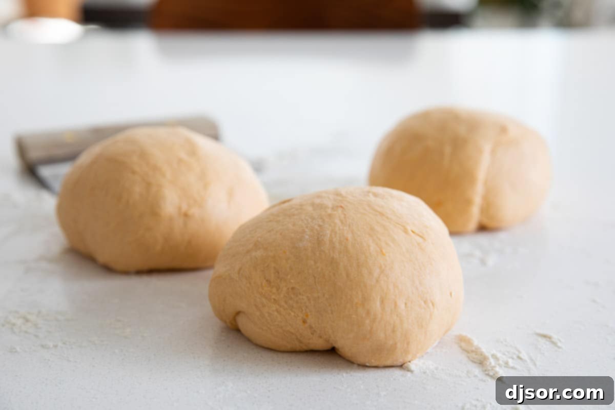 Soft and fluffy and slightly sweet, these Sweet Potato Buttermilk Crescent Rolls are perfect for a holiday. These homemade crescent rolls are so much better than store bought! how to make sweet potato buttermilk crescent rolls