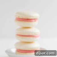 Tropical Strawberry Macarons 2 stack of three strawberry colada macarons.