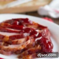 Brown Sugar and Cherry Glazed Ham on a serving platter
