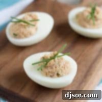Zesty Ham and Egg Medley 4 Close-up of Deviled Ham and Eggs with chive garnish