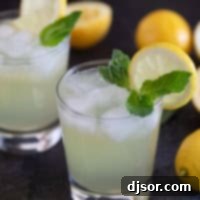 Refreshing Mint Basil Lemonade 8 Glass of Mint and Basil Lemonade topped with fresh mint and basil.