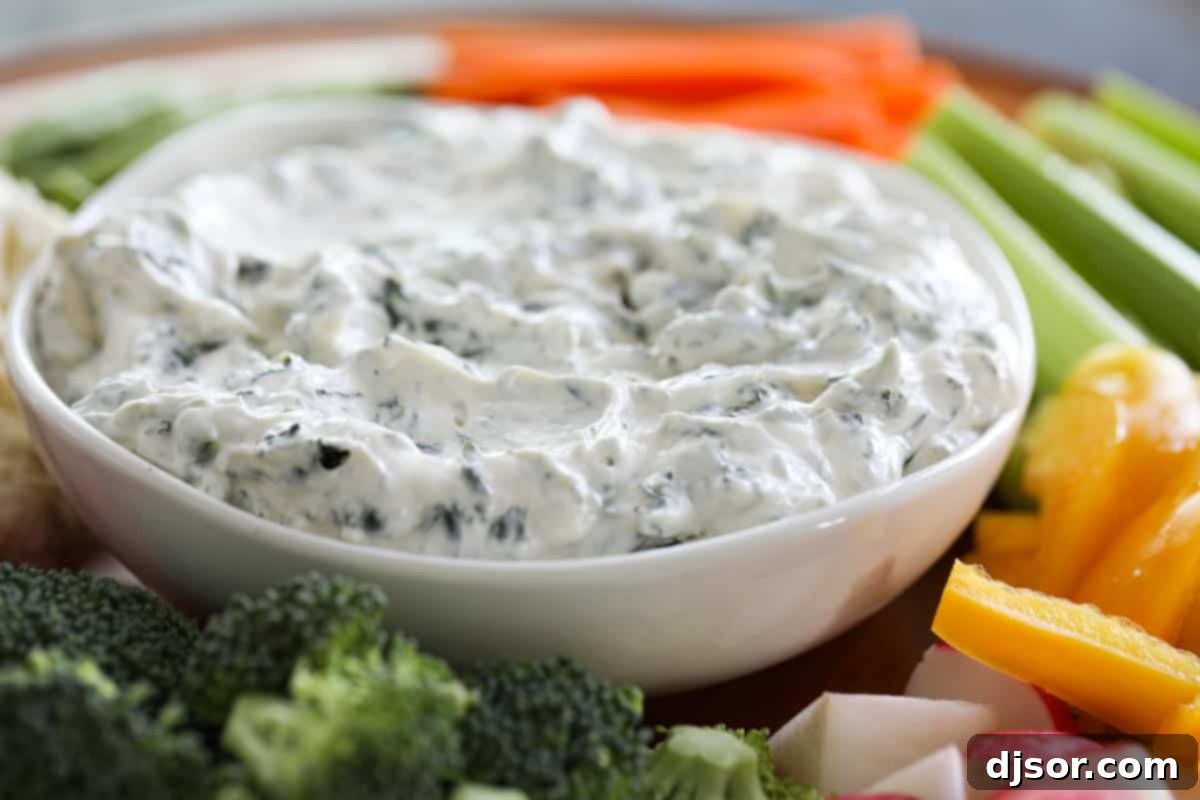Spinach Dip with Fresh Vegetables arranged on a platter