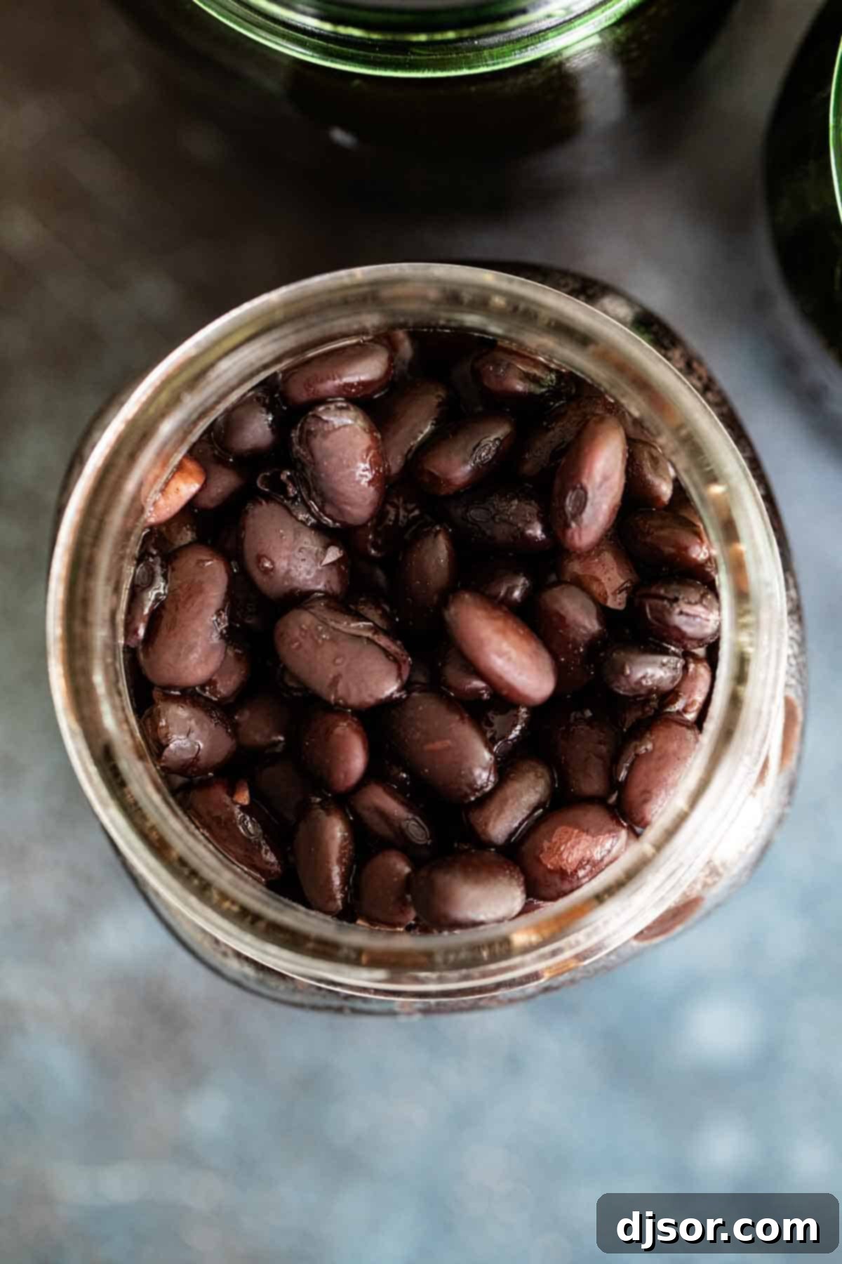 Slow Cooked Black Beans 4 Homemade Slow Cooker Black Beans stored in mason jars.
