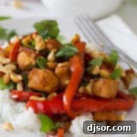 Thai Chili Chicken 4 Spicy Thai Chicken with bell peppers and peanuts, a delicious and quick homemade Thai dish.