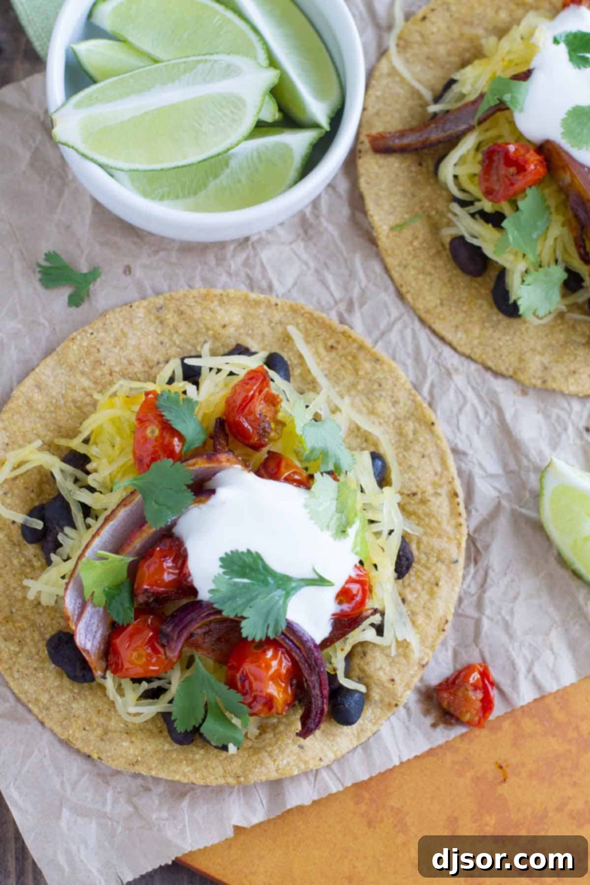 Appetizing Vegetarian Tostadas garnished with fresh sour cream and vibrant cilantro, ready to be served.