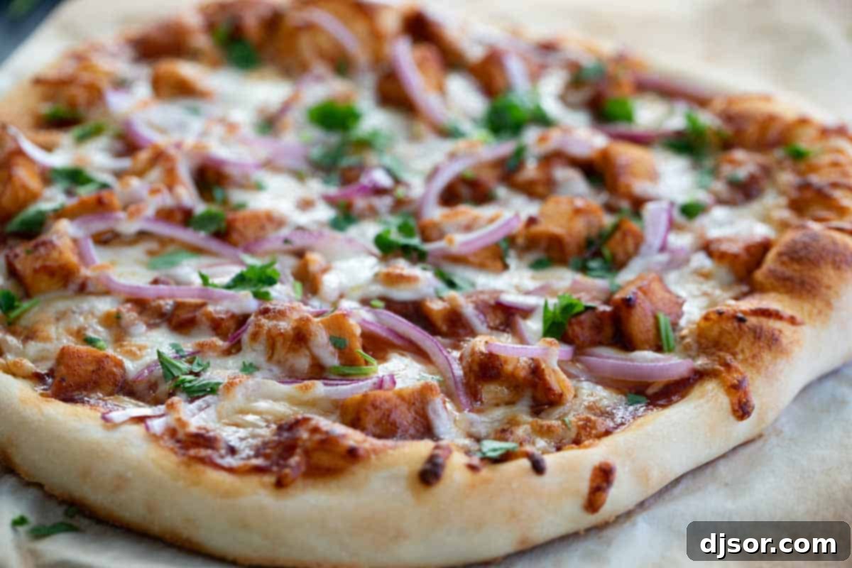 Copycat BBQ Chicken Pizza with onions and cilantro, perfect for a family dinner